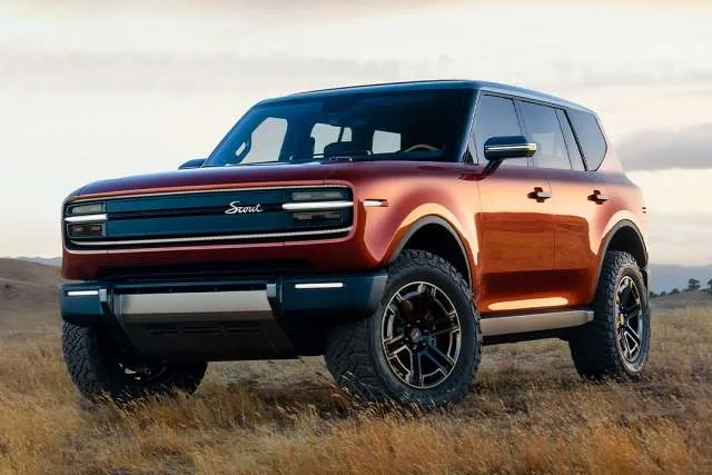 A modern Scout vehicle in a California landscape